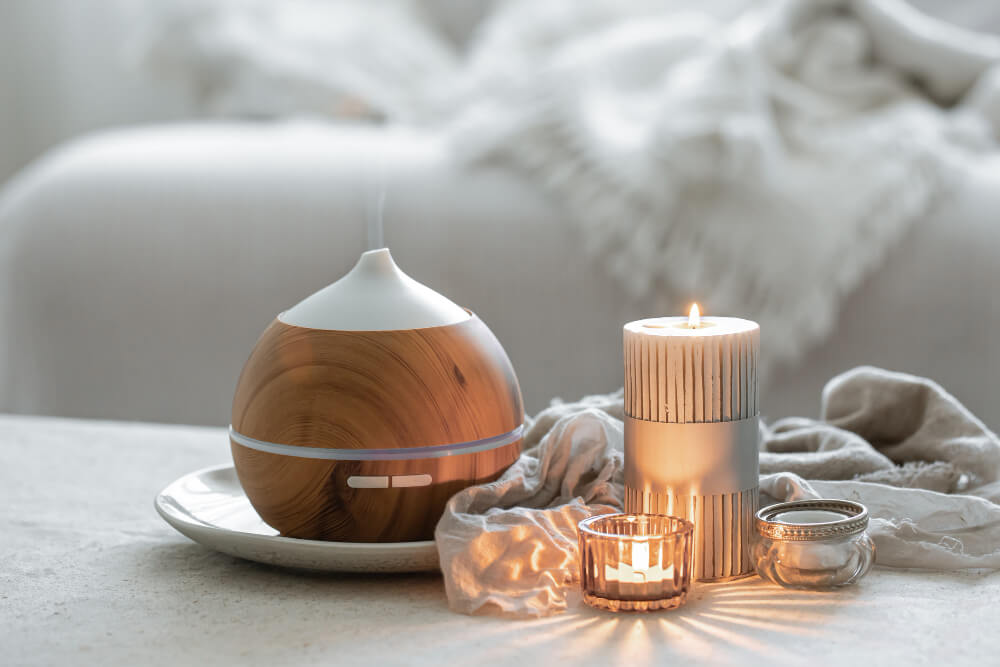 still-life-with-aroma-diffuser-moisturizing-air-burning-candles (1)